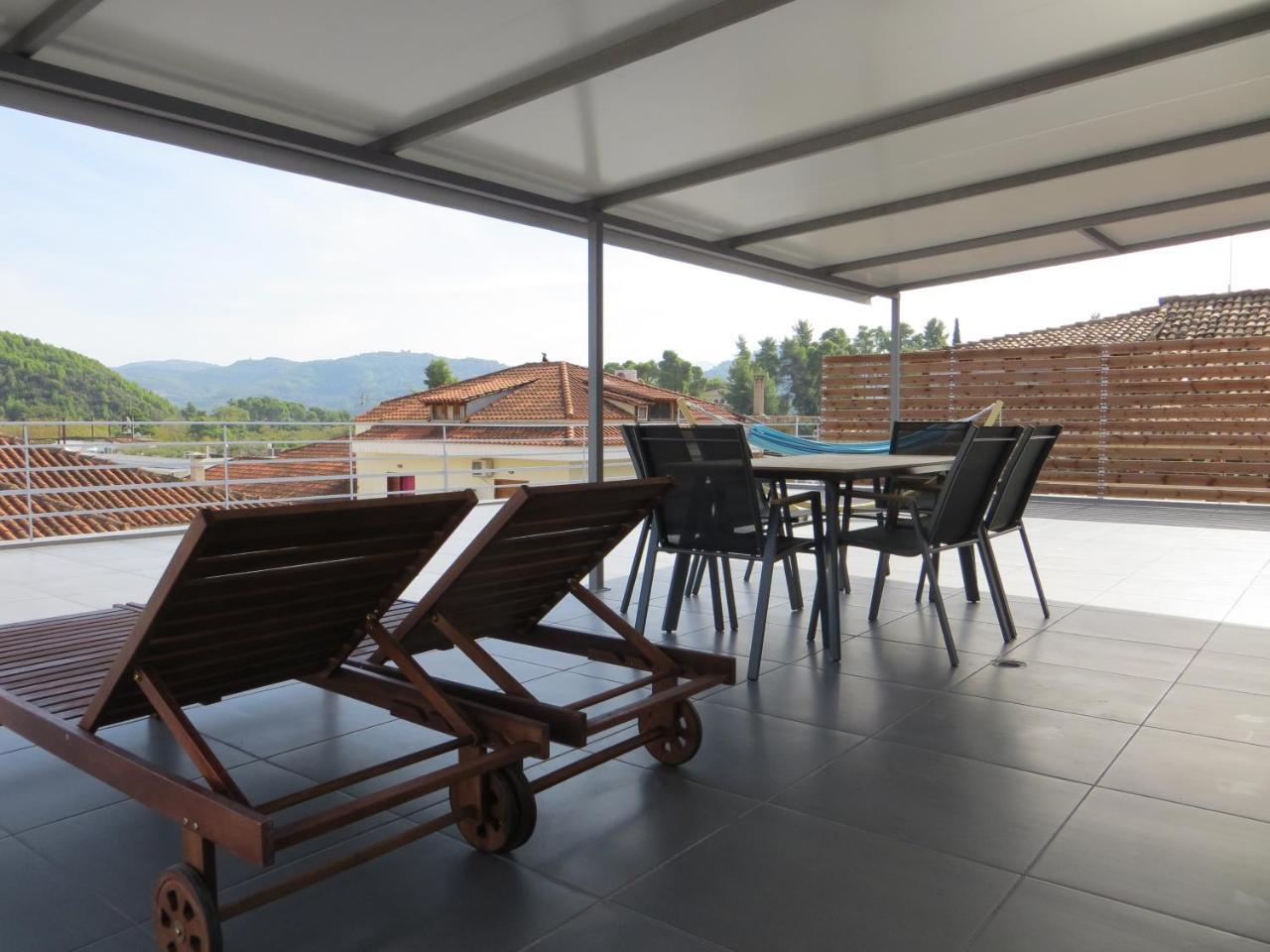 Leonidaion Guesthouse Olympie Extérieur photo Rooftop terrace