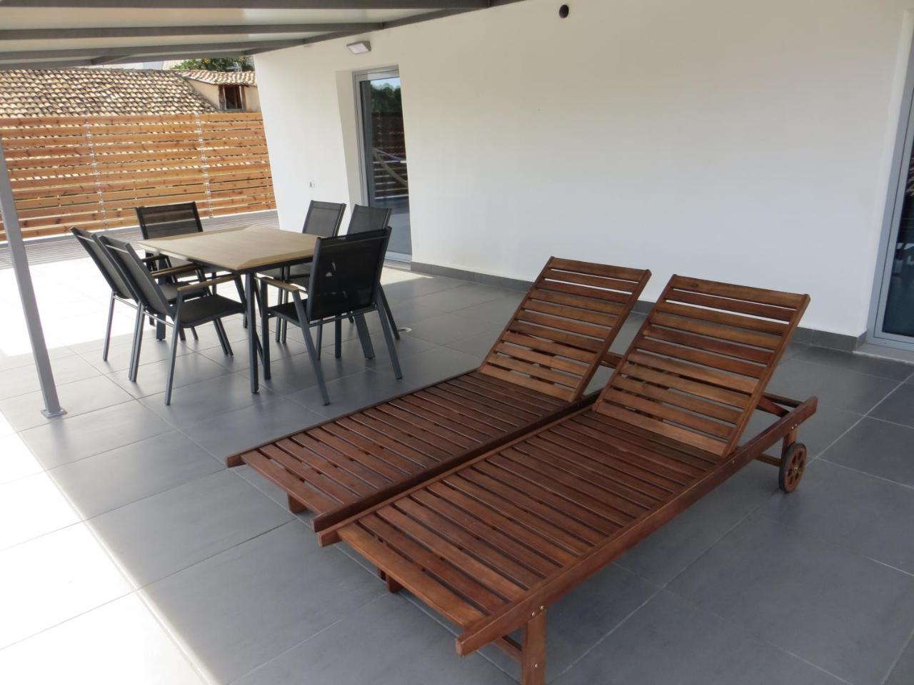 Leonidaion Guesthouse Olympie Extérieur photo Outdoor furniture