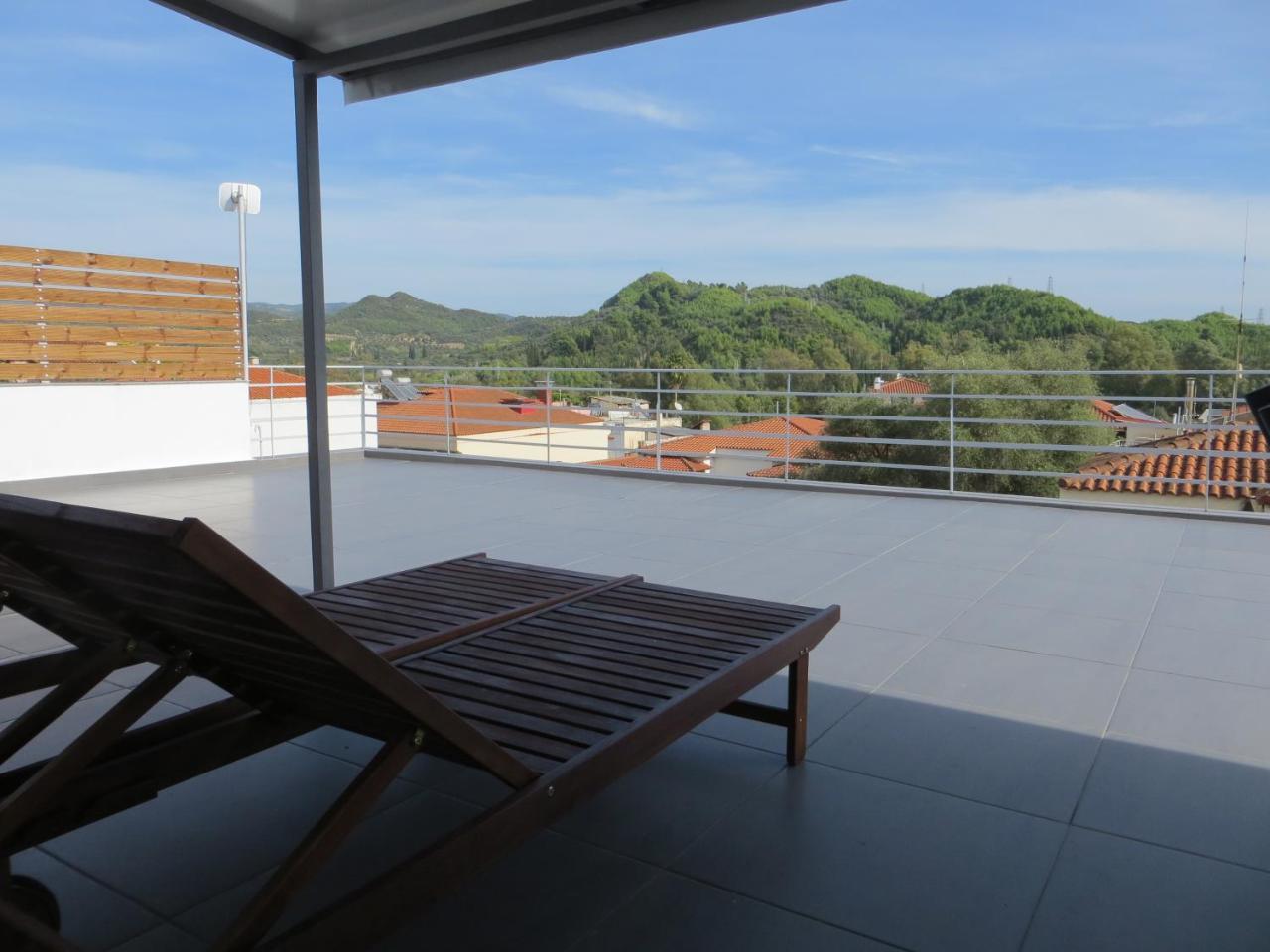 Leonidaion Guesthouse Olympie Extérieur photo A roof terrace in Spain