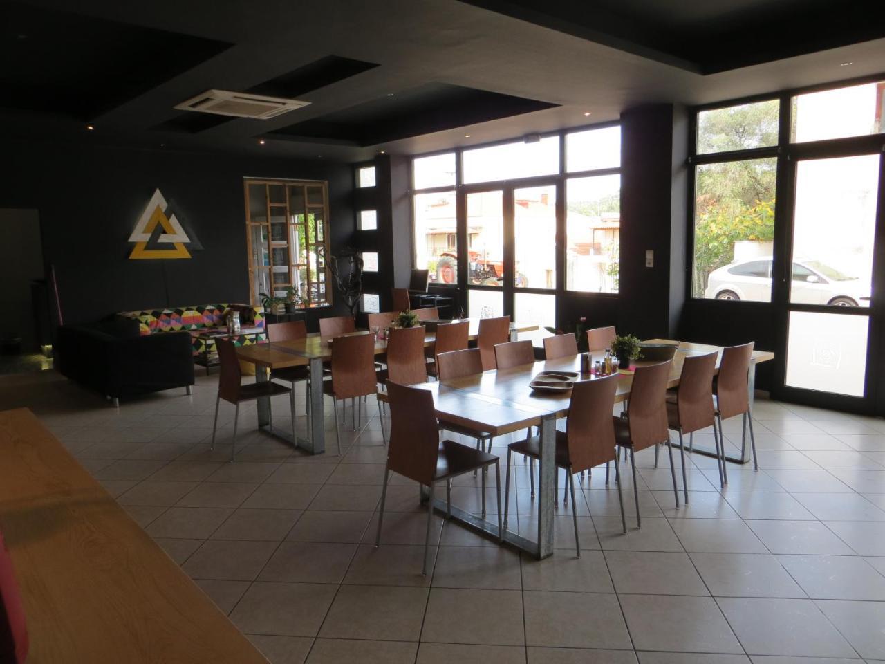 Leonidaion Guesthouse Olympie Extérieur photo The interior of a Thai restaurant in France